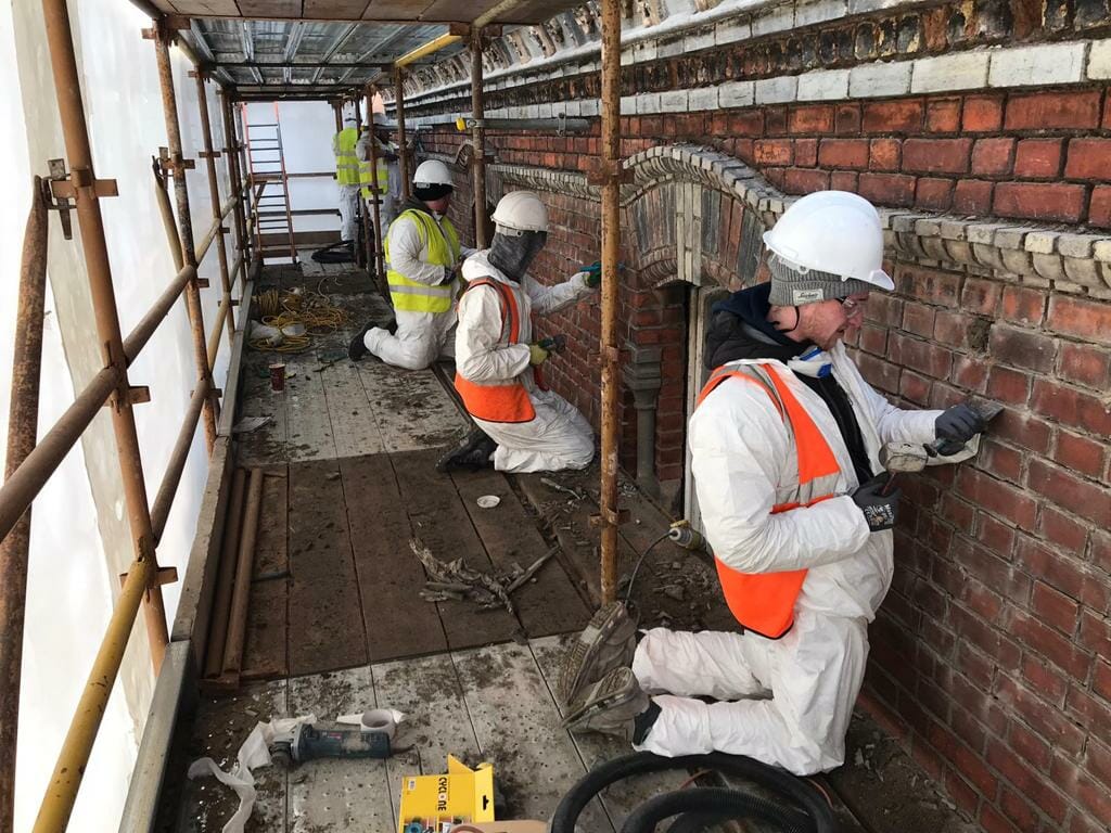 PMAC Brick restoration team PMAC operatives working on side elevations of building