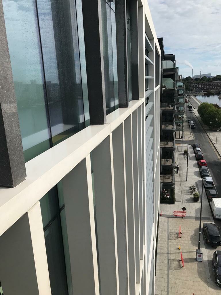 Techcrete curtain facade cleaned by PMAC Techcrete columns and beams cleaned