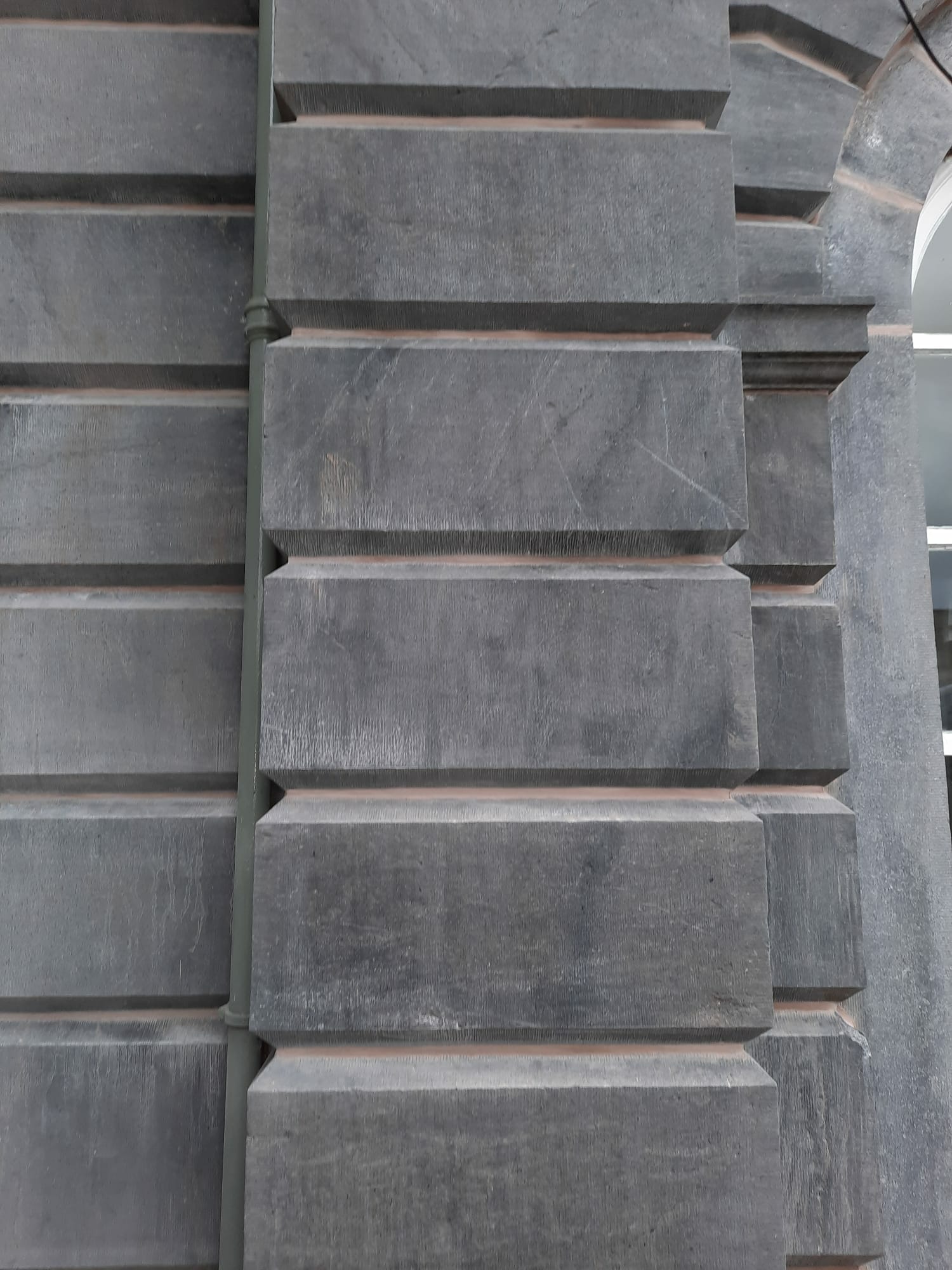 Limestone repointed Limestone column repointed in matching lime mortar