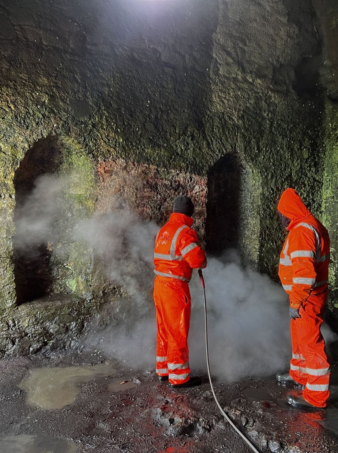 PMAC team removing graffiti from Hell Fire Club PMAC team removing graffiti from Hell Fire Club