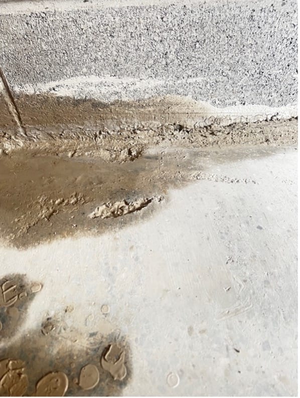 Uneven and badly finished poured concrete floor Uneven and badly finished poured concrete floor